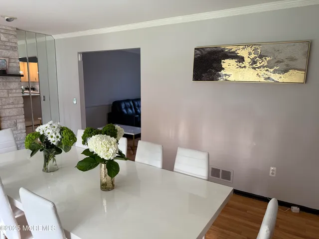 a vase of flowers sitting on a table