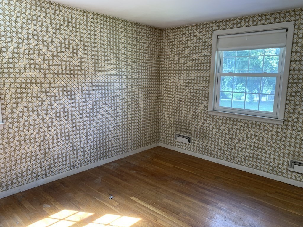 22 Redman Road Canton, MA 02021 - Photo 7 of 13 a view of a room with wooden floor
