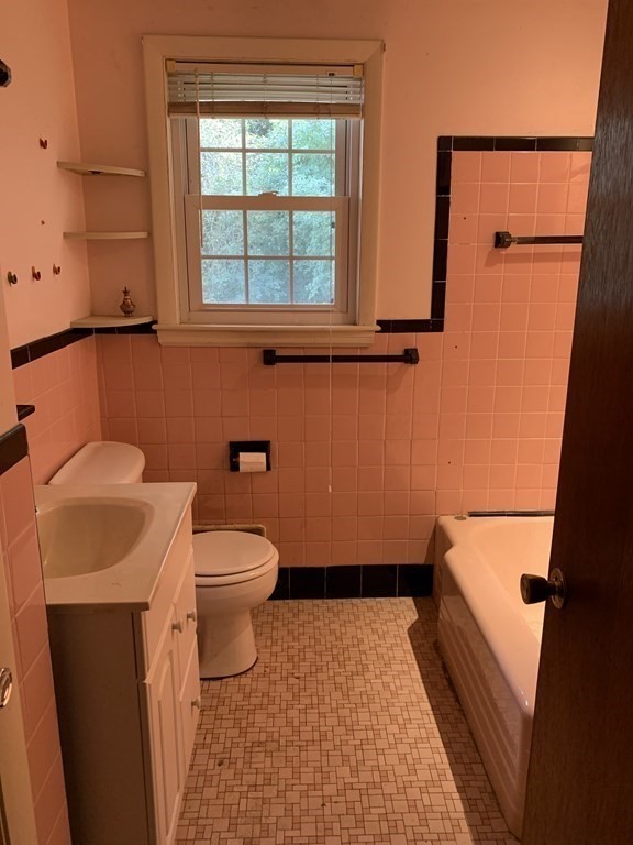 22 Redman Road Canton, MA 02021 - Photo 9 of 13 a bathroom with a toilet and a shower