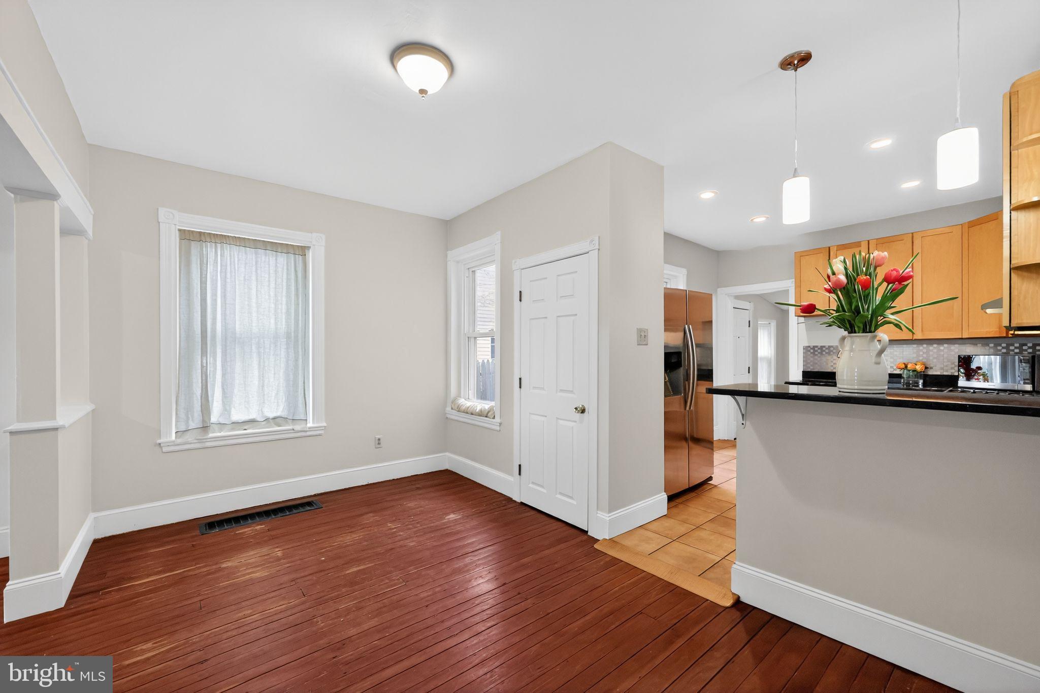 5443 Morris Street Philadelphia, PA 19144 - Photo 11 of 37 a view of a kitchen with wooden floor and a window