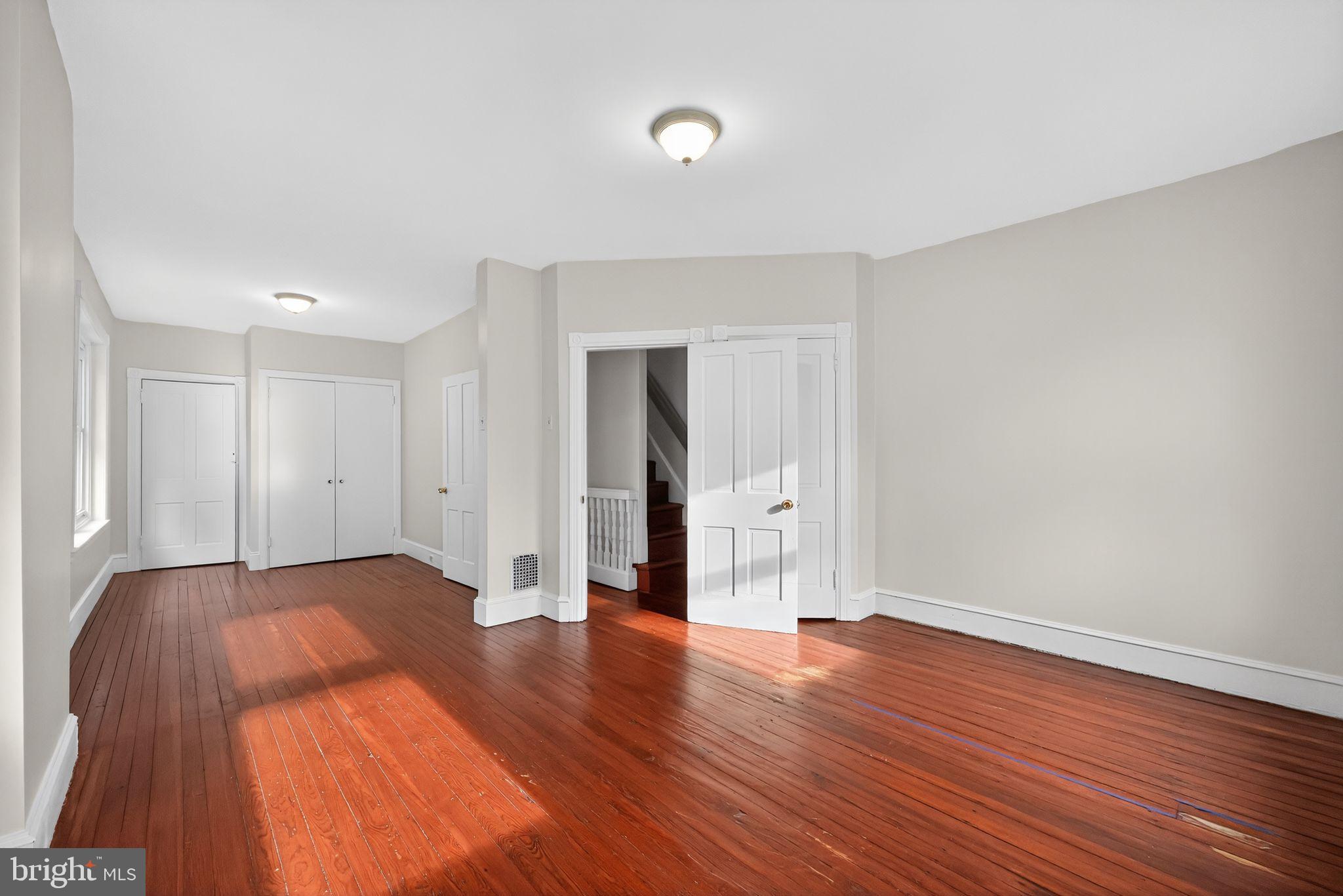 5443 Morris Street Philadelphia, PA 19144 - Photo 18 of 37 a view of a room with wooden floor and brick walls