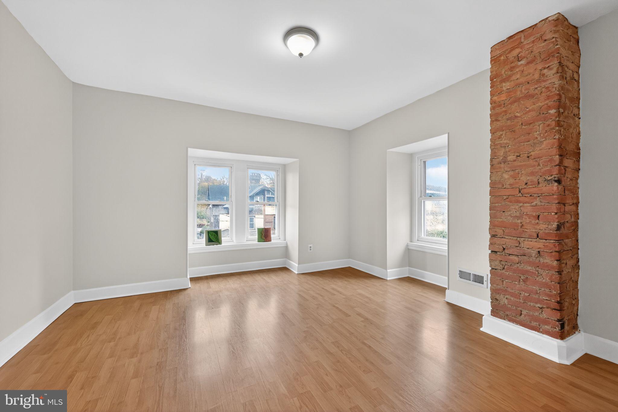5443 Morris Street Philadelphia, PA 19144 - Photo 28 of 37 an empty room with wooden floor and windows