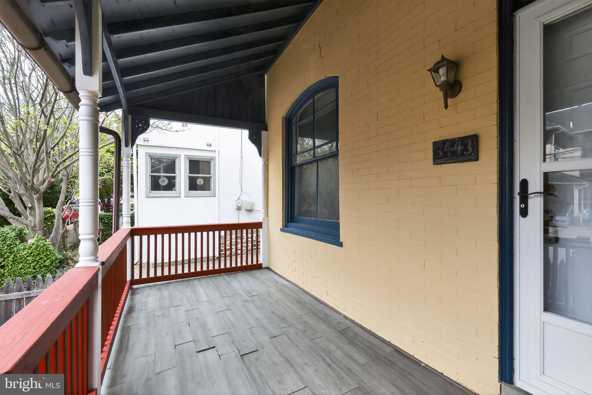 5443 Morris Street Philadelphia, PA 19144 - Photo 3 of 37 a view of a porch with wooden floor and floor to ceiling window