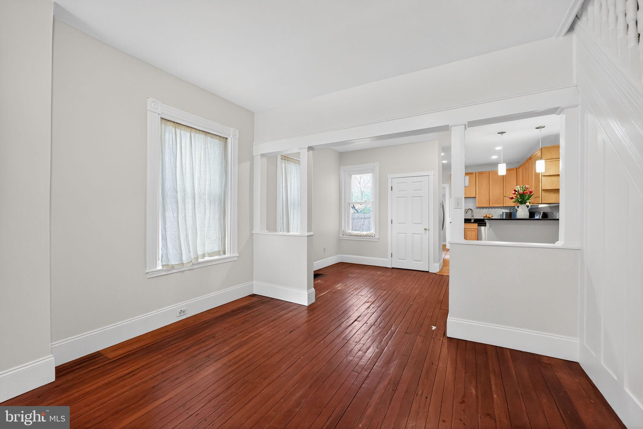 5443 Morris Street Philadelphia, PA 19144 - Photo 7 of 37 an empty room with wooden floor and windows