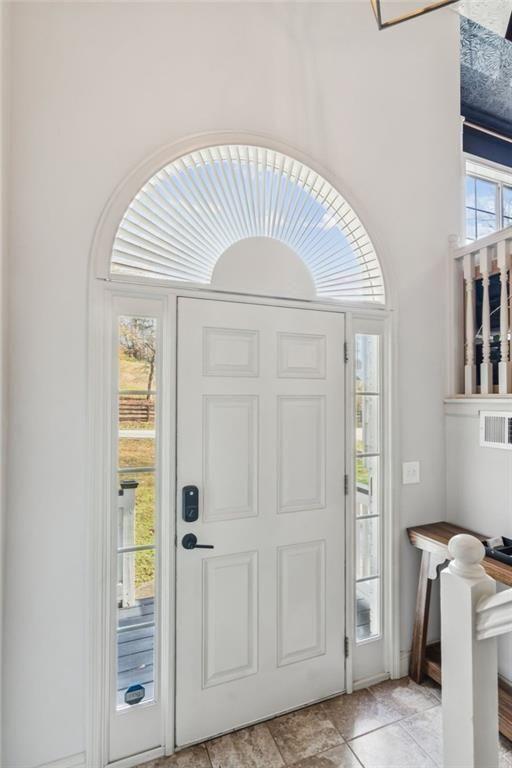 5595 Vaughn Road Woodstock, GA 30188 - Photo 5 of 42 a view of an empty room with a window