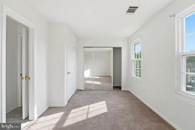 a view of an empty room with window