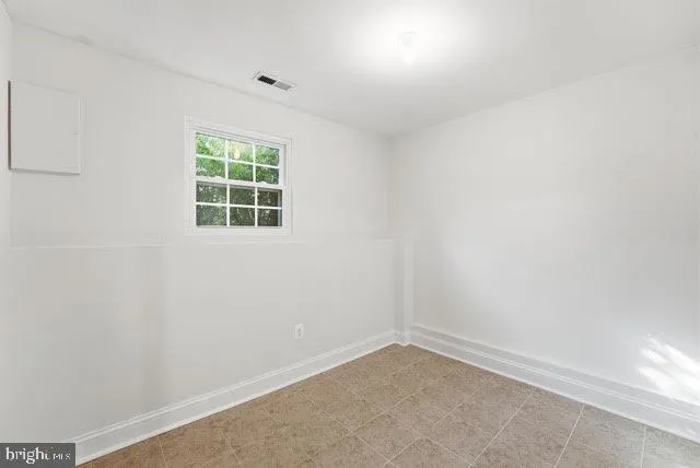 an empty room with a window