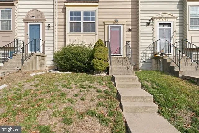 a view of a backyard of the house