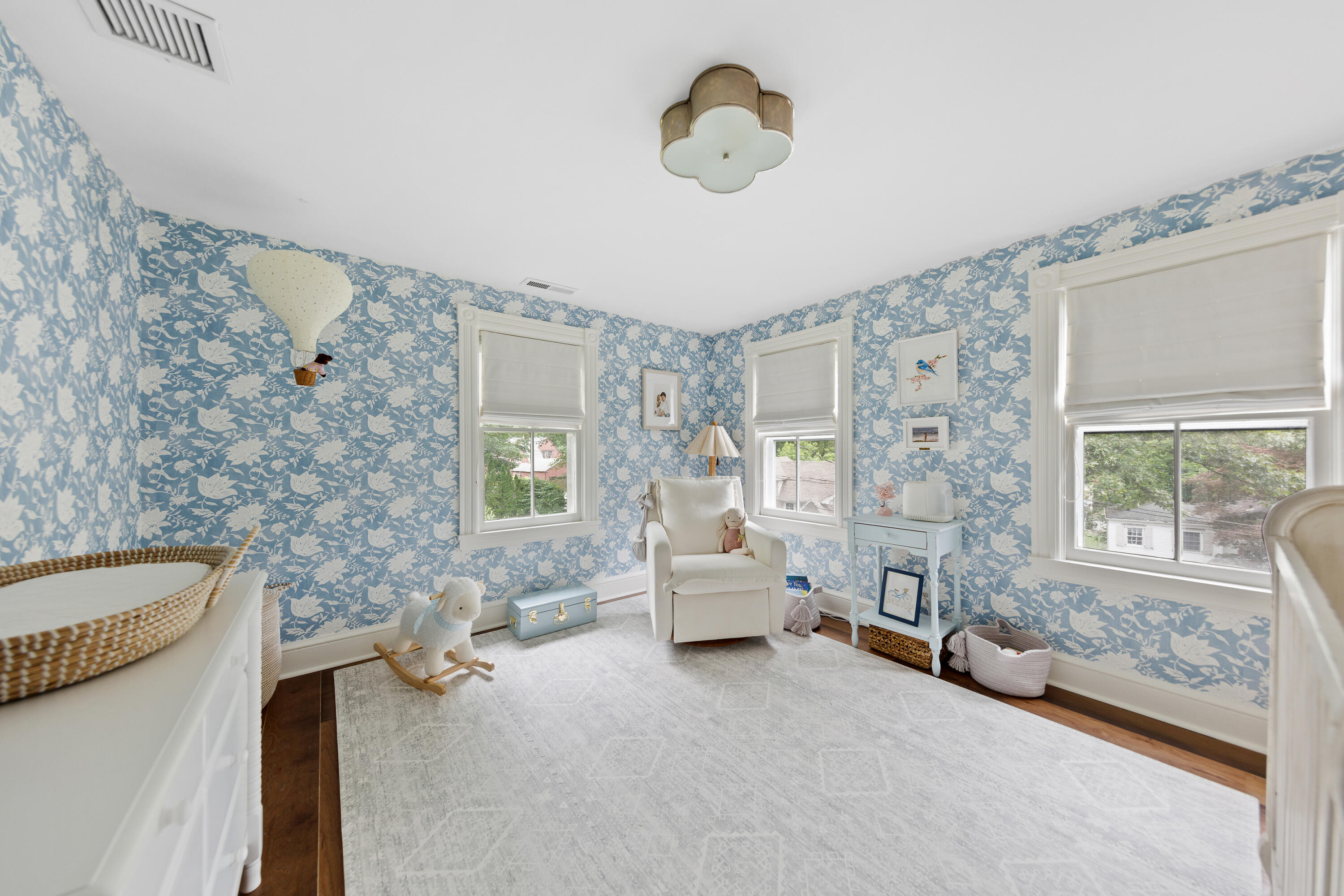 25 Raymond Street Darien, CT 06820 - Photo 14 of 28 a living room with furniture and a large window