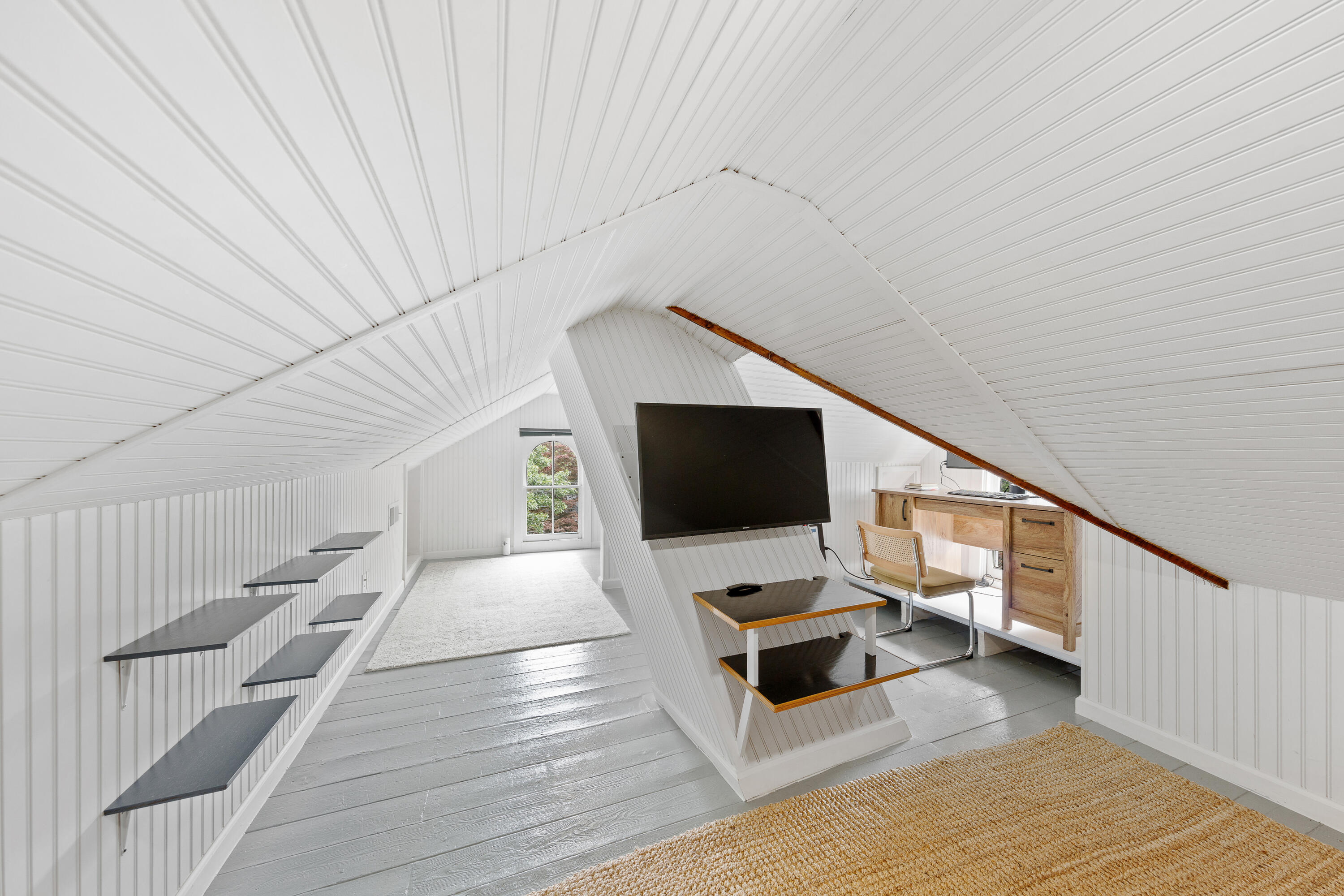25 Raymond Street Darien, CT 06820 - Photo 17 of 28 a living room with furniture and a flat screen tv