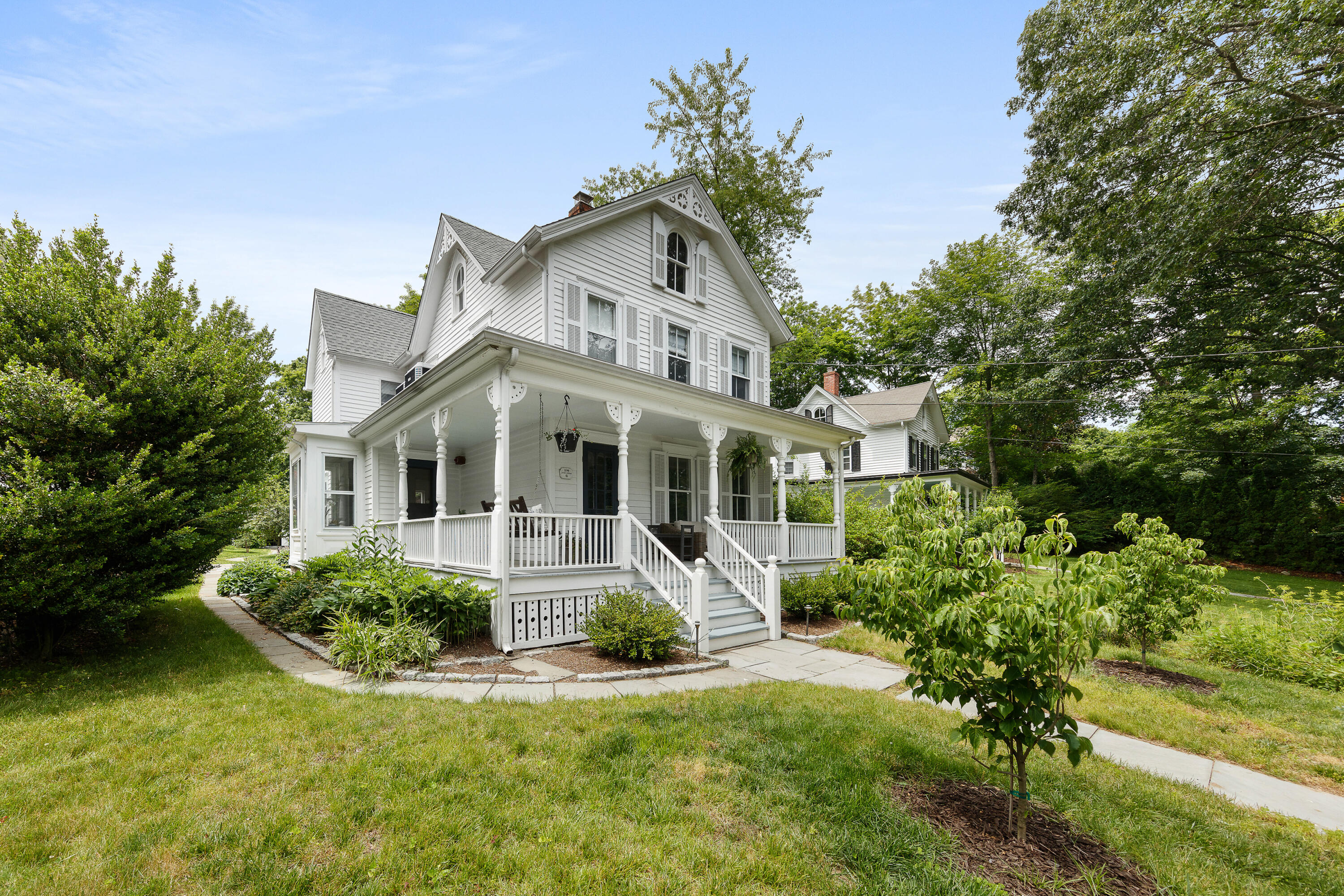 25 Raymond Street Darien, CT 06820 - Photo 22 of 28 a front view of house with yard and green space