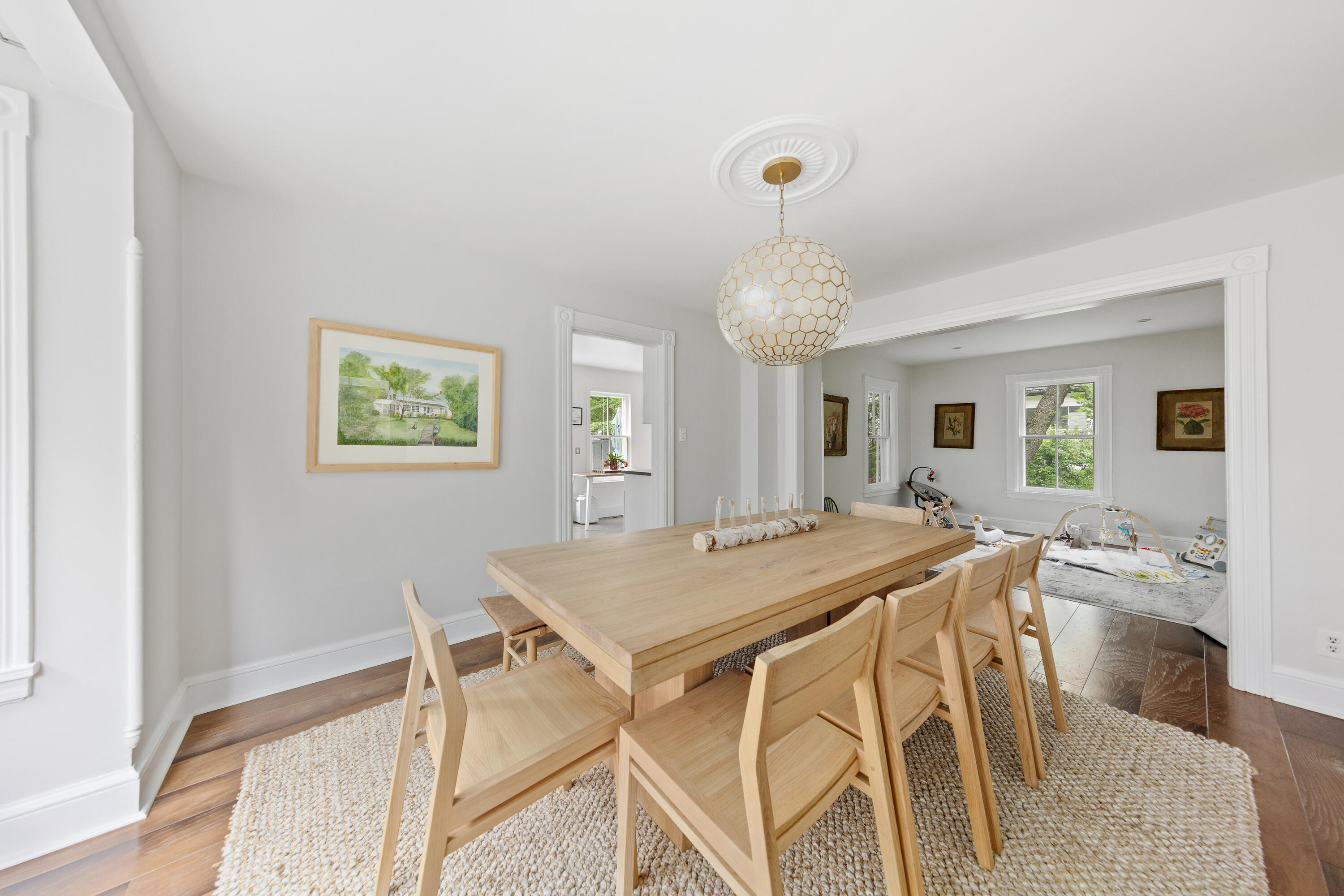 25 Raymond Street Darien, CT 06820 - Photo 7 of 28 a view of a dining room with furniture and a chandelier