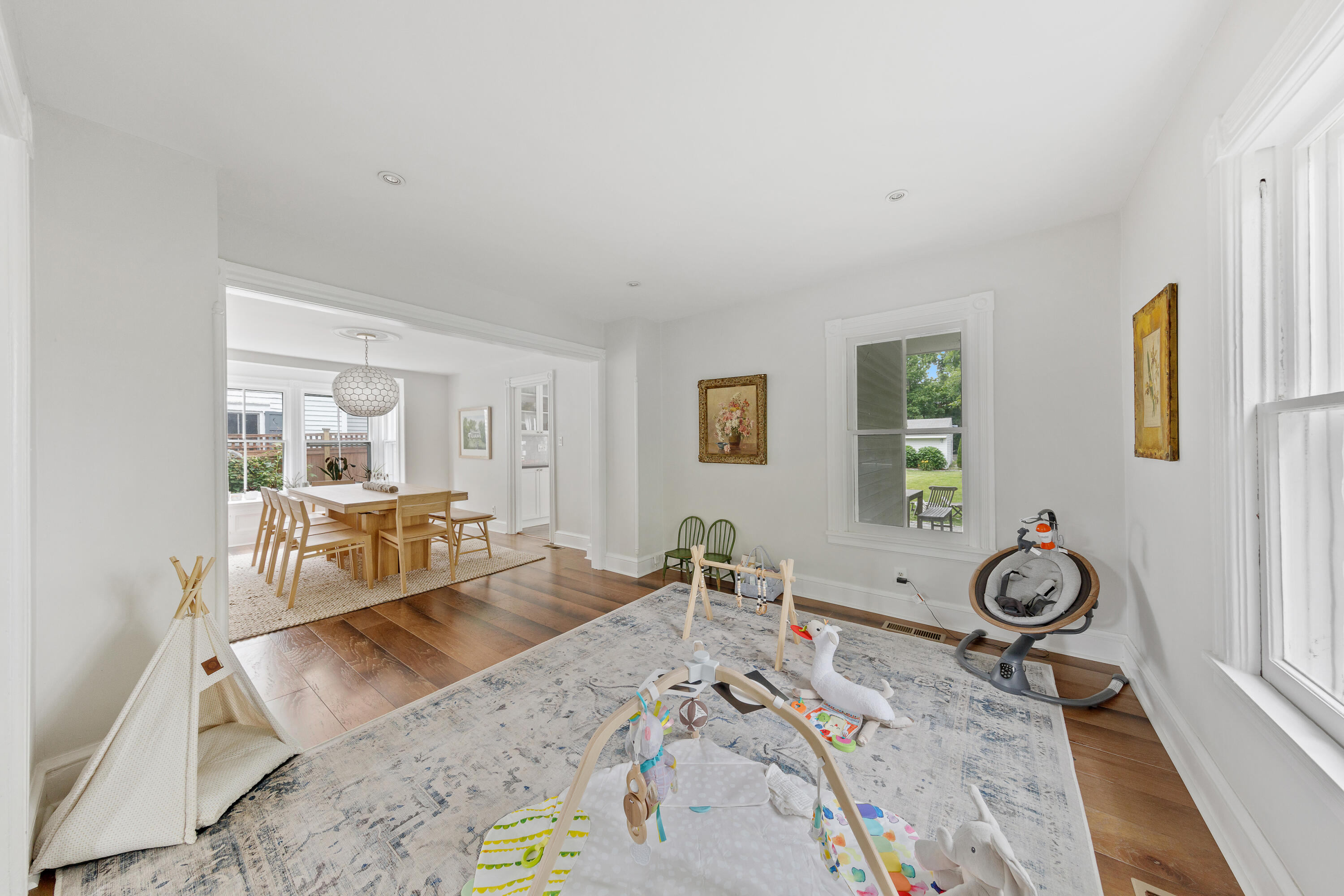 25 Raymond Street Darien, CT 06820 - Photo 8 of 28 a living room with furniture a couch and wooden floor