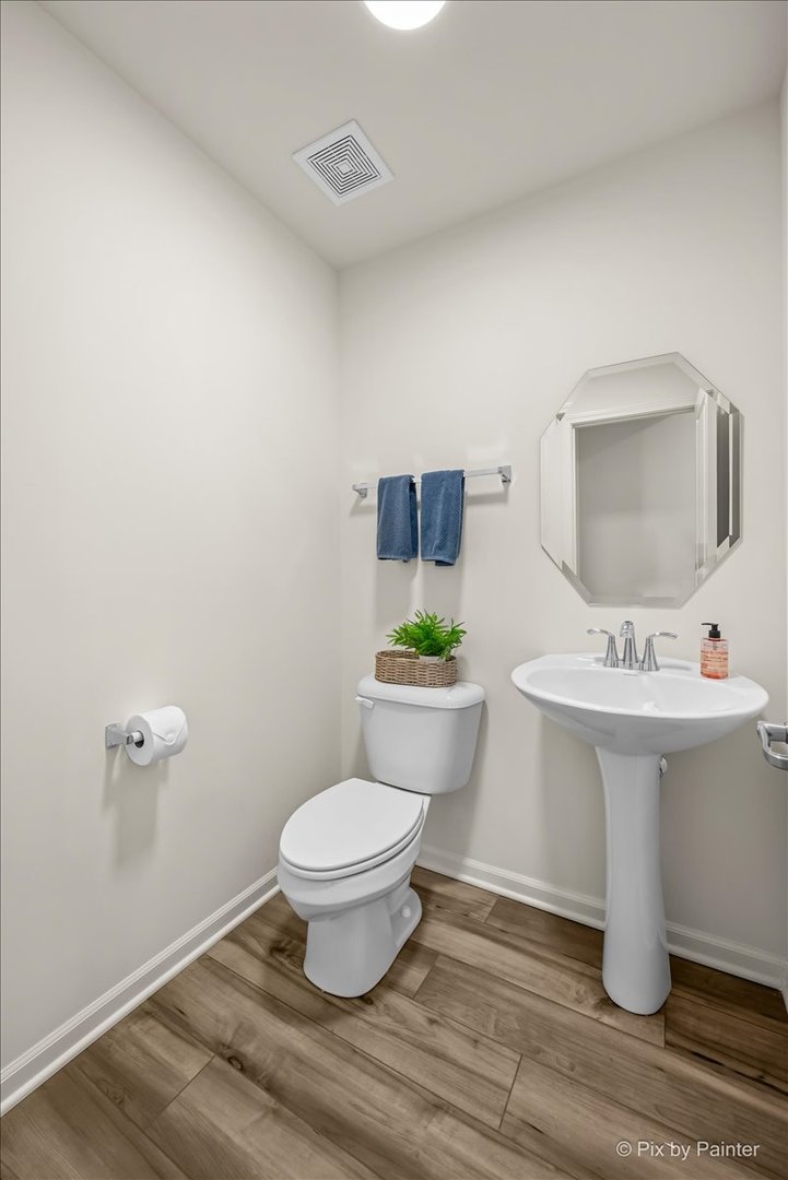 1623 BENTZ Way Batavia, IL 60510 - Photo 8 of 29 a bathroom with a sink toilet and mirror