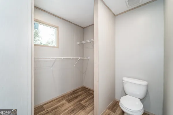 a bathroom with a toilet