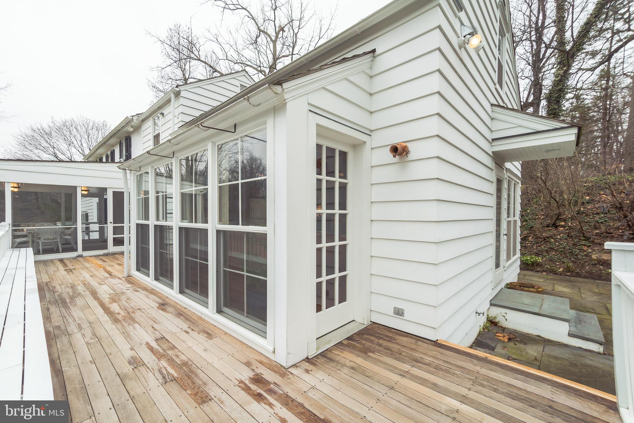 911 North Valley Road Paoli, PA 19301 - Photo 11 of 36 Deck off Kitchen and Screened Porch