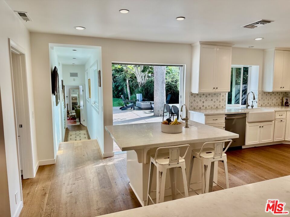 1314 Preston Way Venice, CA 90291 - Photo 16 of 30 a view of a dining room with furniture and wooden floor