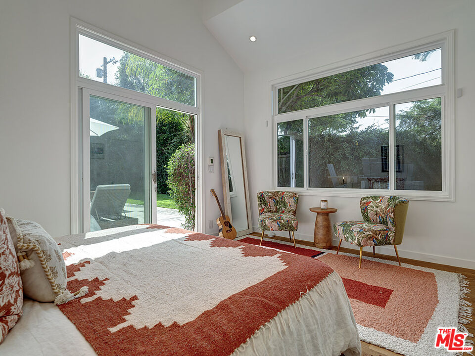 1314 Preston Way Venice, CA 90291 - Photo 19 of 30 a bed sitting in a bedroom next to a window