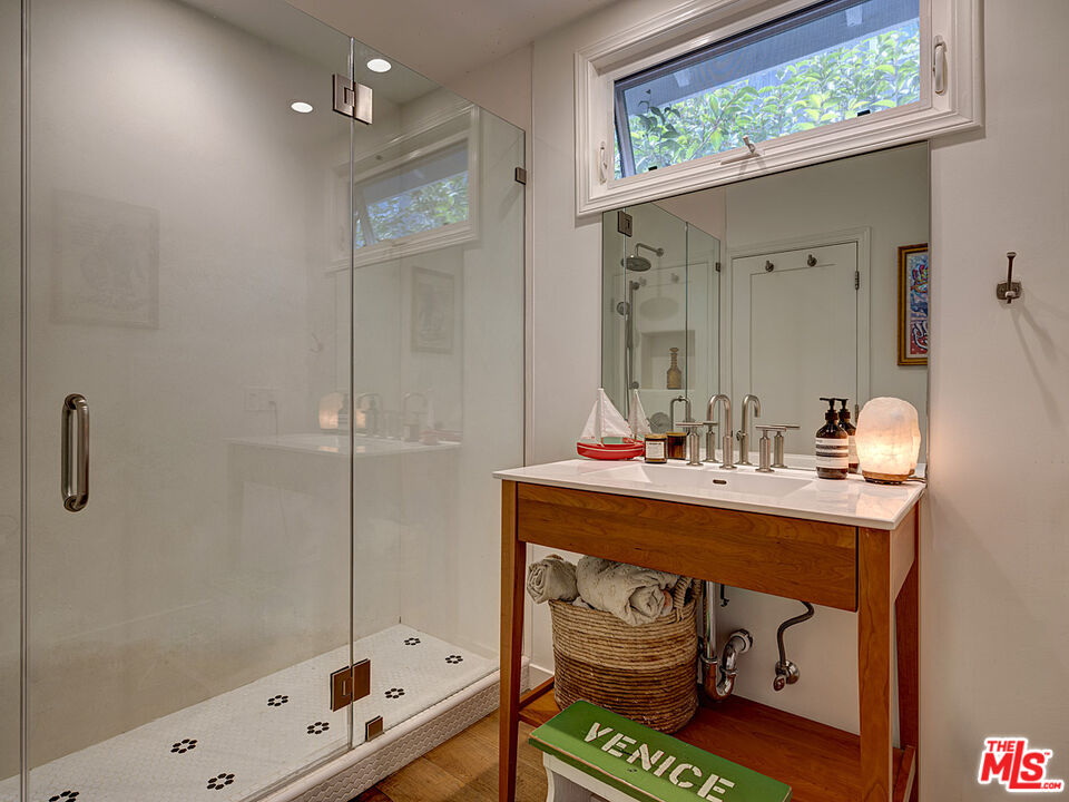 1314 Preston Way Venice, CA 90291 - Photo 24 of 30 a bathroom with a sink and a mirror