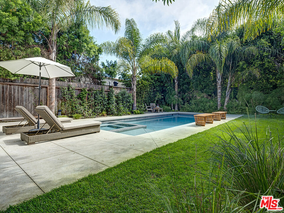 1314 Preston Way Venice, CA 90291 - Photo 28 of 30 a view of a swimming pool with a garden and patio