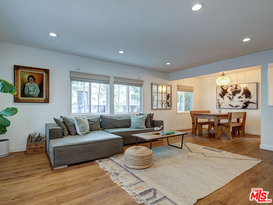 1314 Preston Way Venice, CA 90291 - Photo 8 of 30 a living room with furniture and a large window