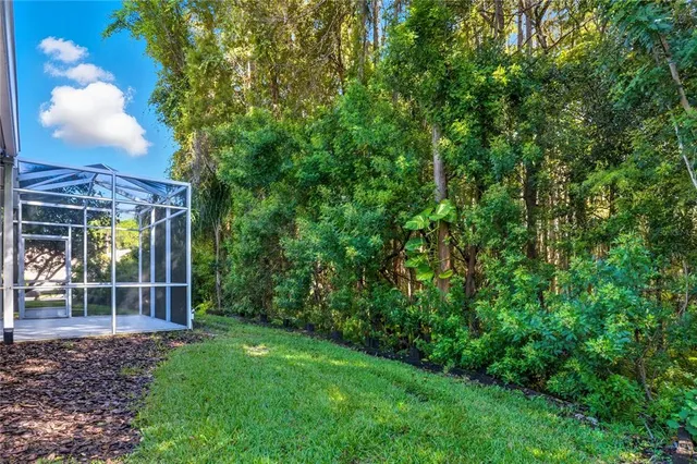 a view of swimming pool with a garden