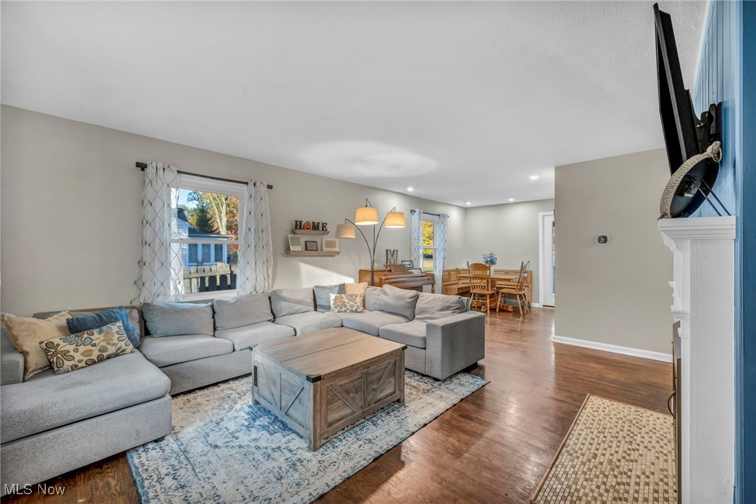 149 Jaycox Road Avon Lake, OH 44012 - Photo 23 of 42 Living area featuring wood finished floors and baseboards