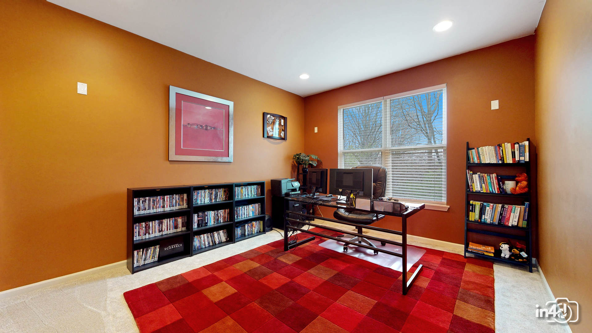 3 Ridge Court Bolingbrook, IL 60440 - Photo 16 of 52 a living room with furniture a rug and a bookshelf