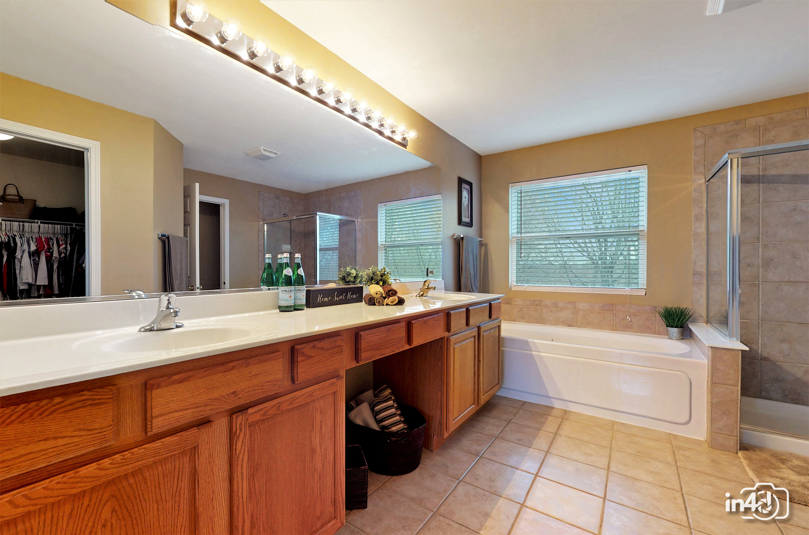 3 Ridge Court Bolingbrook, IL 60440 - Photo 34 of 52 a large bathroom with a large tub and sink