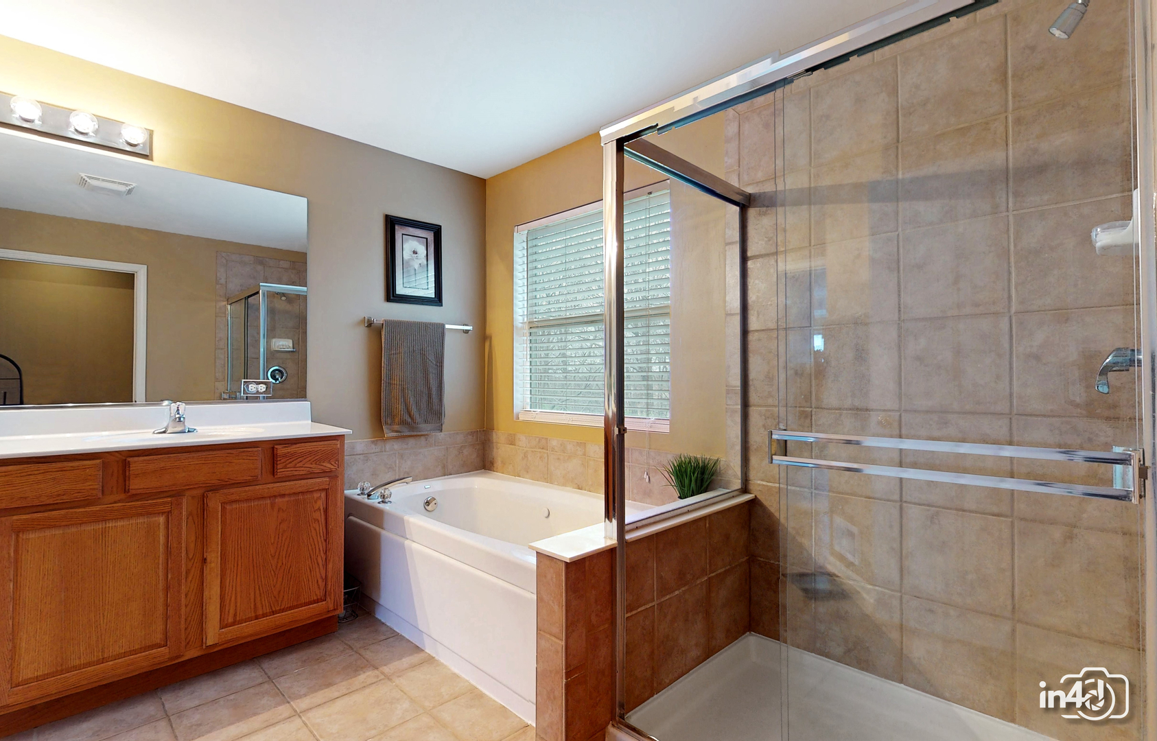 3 Ridge Court Bolingbrook, IL 60440 - Photo 35 of 52 a bathroom with a tub sink and mirror