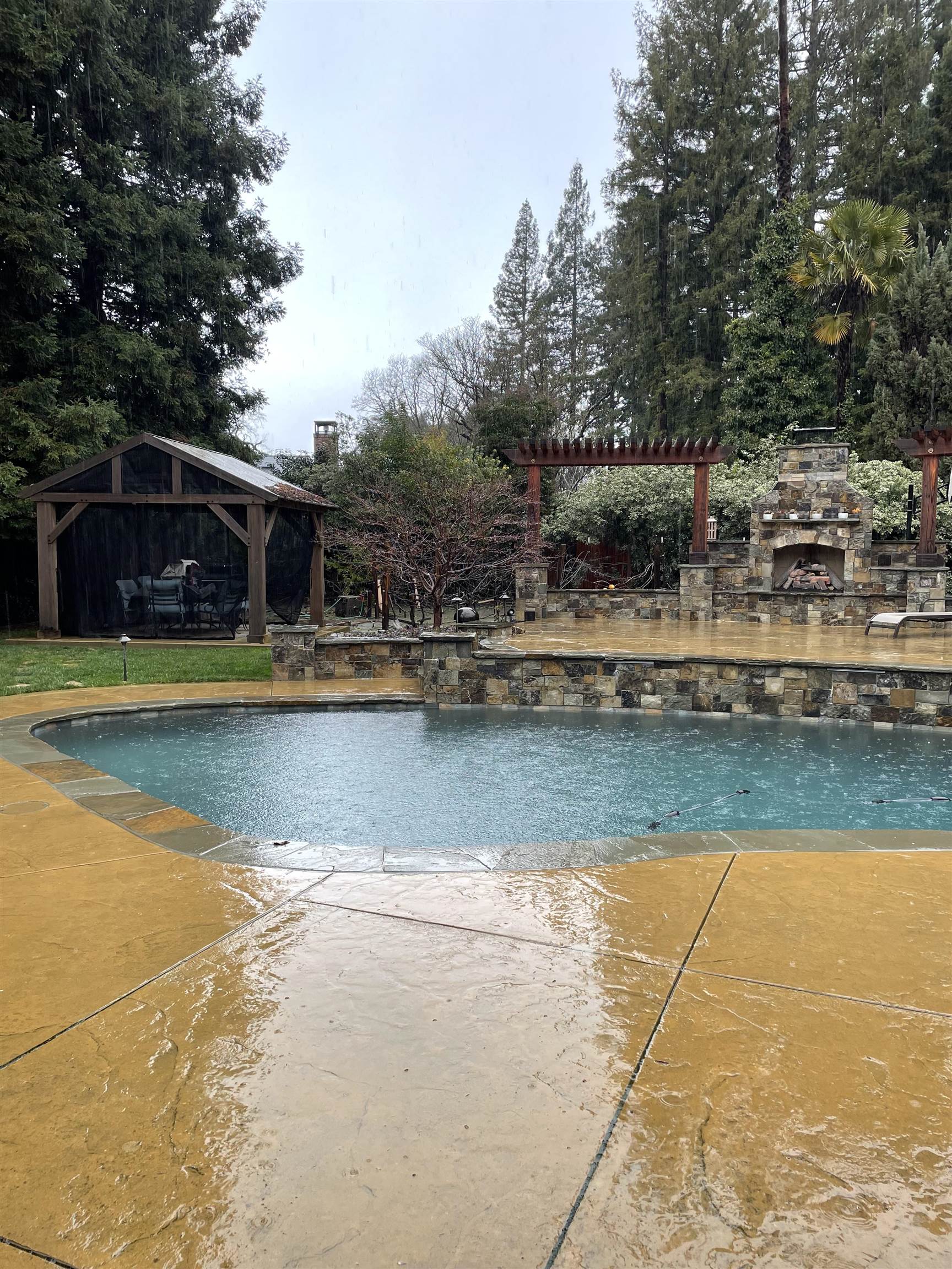 125 Timberline Court Danville, CA 94526 - Photo 7 of 11 a view of a swimming pool with an outdoor seating