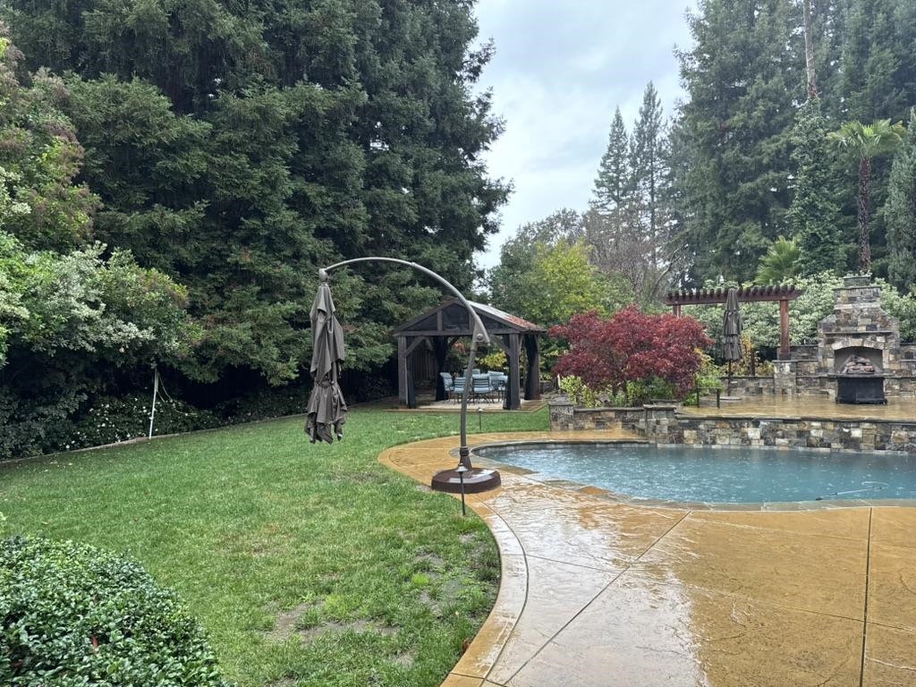 125 Timberline Court Danville, CA 94526 - Photo 8 of 11 a garden view with a swimming pool