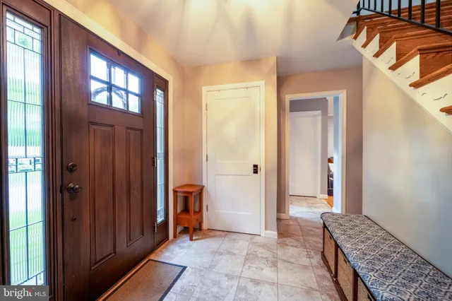 a kitchen with refrigerator a sink and cabinets