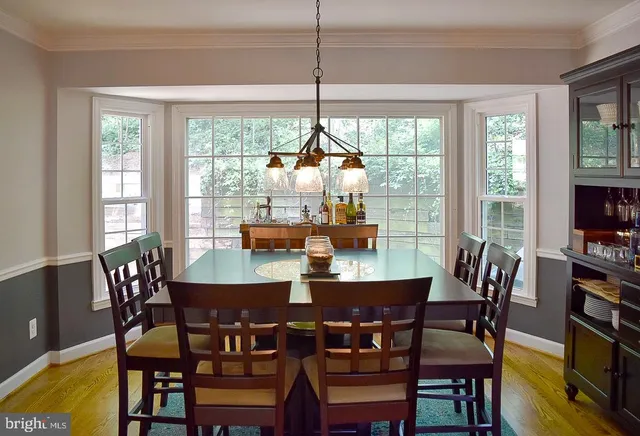a bathroom with a toilet sink and shower