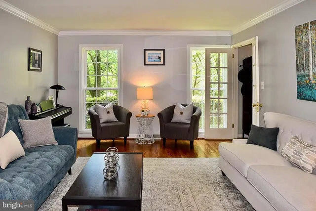 a view of walk in closet with clothes