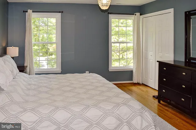 a room with toys and a baby crib