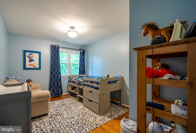 a front view of a house with a yard and a garage