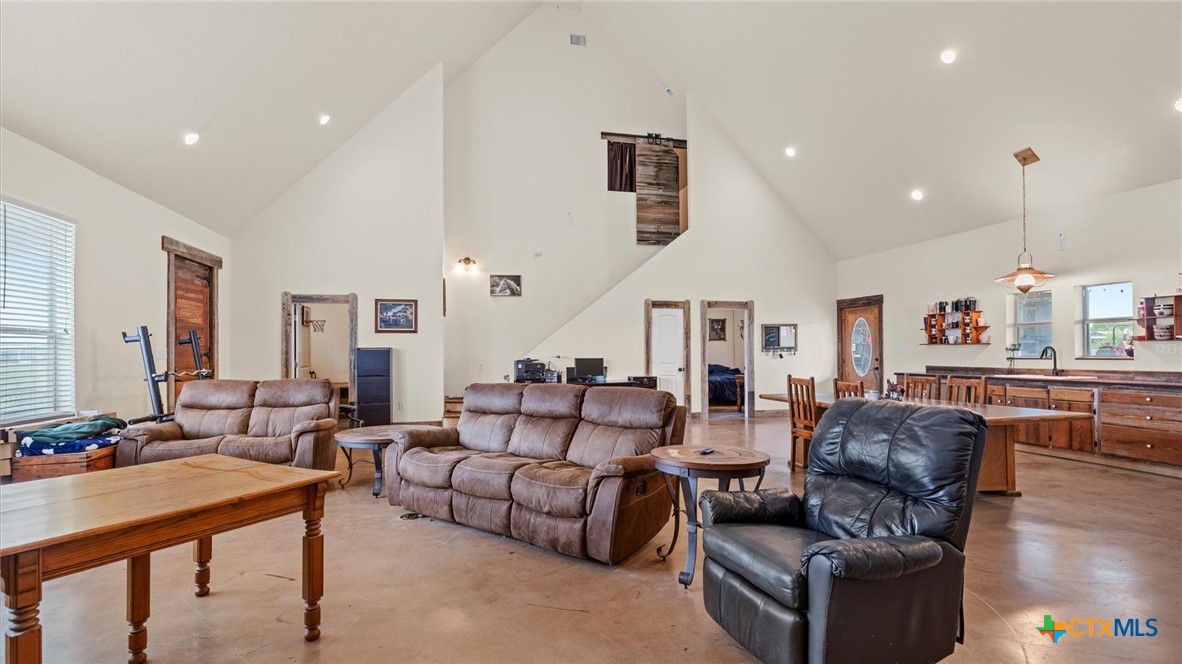 707 Creek Road Marion, TX 78124 - Photo 8 of 32 a living room with furniture and wooden floor
