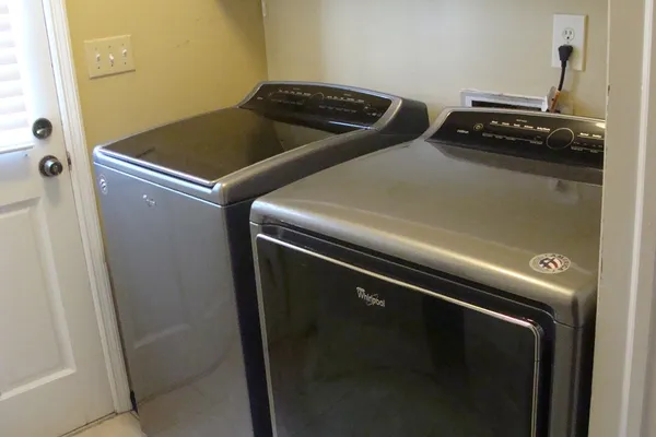 an empty room with wooden floor