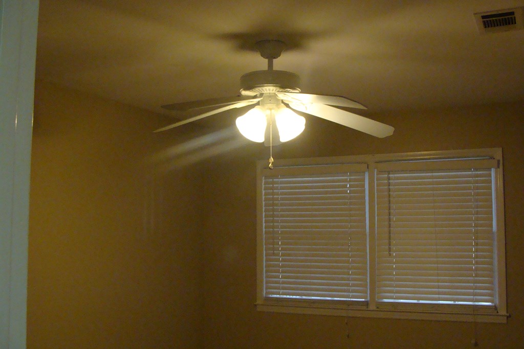 2215 Coventry Drive Columbus, GA 31904 - Photo 15 of 24 a view of a livingroom with a chandelier fan