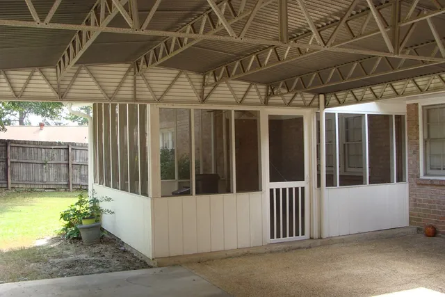 a view of a porch with a door