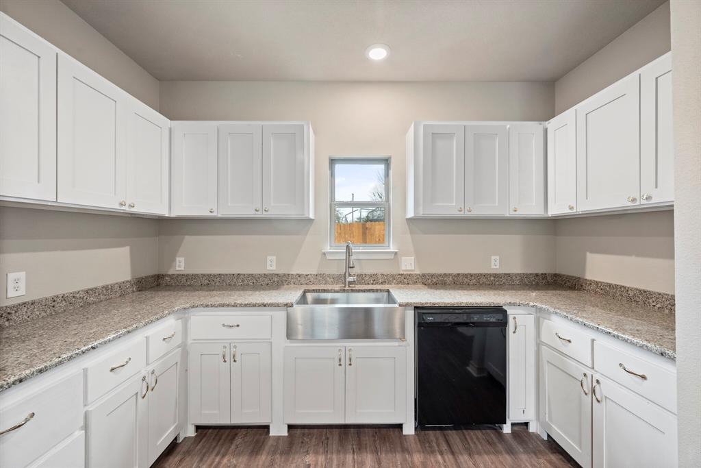 2877 Conveyor Drive, Unit B Burleson, TX 76028 - Photo 8 of 22 Kitchen featuring dishwasher, white cabinetry, dark wood-type flooring, and recessed lighting