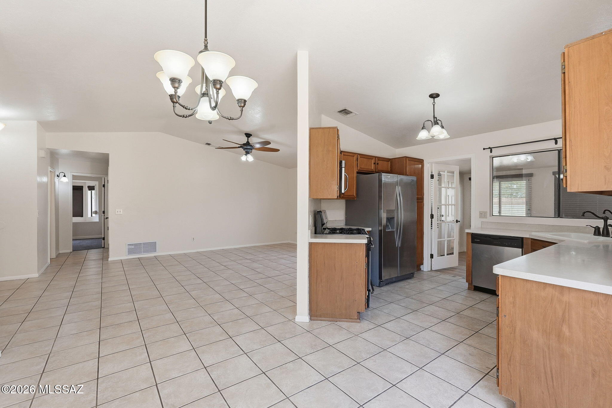 5791 North Moonbrook Road Tucson, AZ 85741 - Photo 13 of 40 Great Room Flows into Kitchen