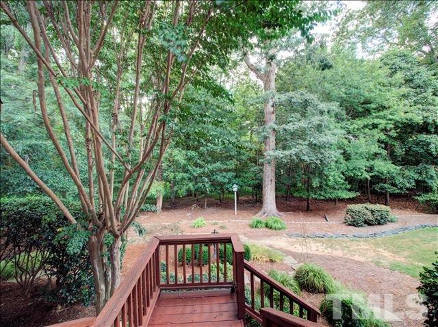 4620 Hidden Harbor Lane Raleigh, NC 27615 - Photo 22 of 25 Private, landscaped backyard.