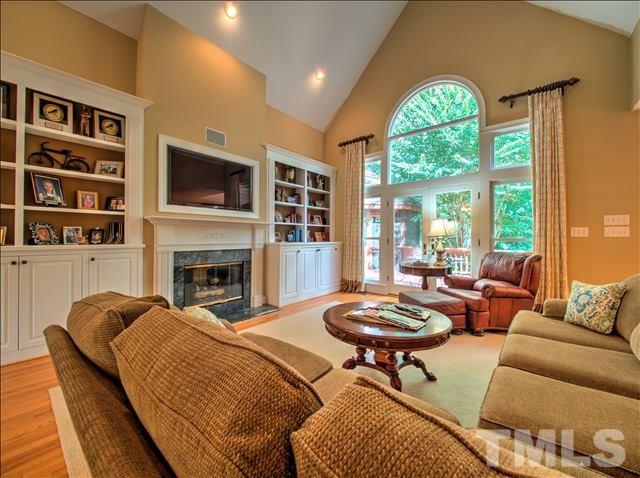 4620 Hidden Harbor Lane Raleigh, NC 27615 - Photo 10 of 25 Built-ins and floor to ceiling windows...tons of natural light!