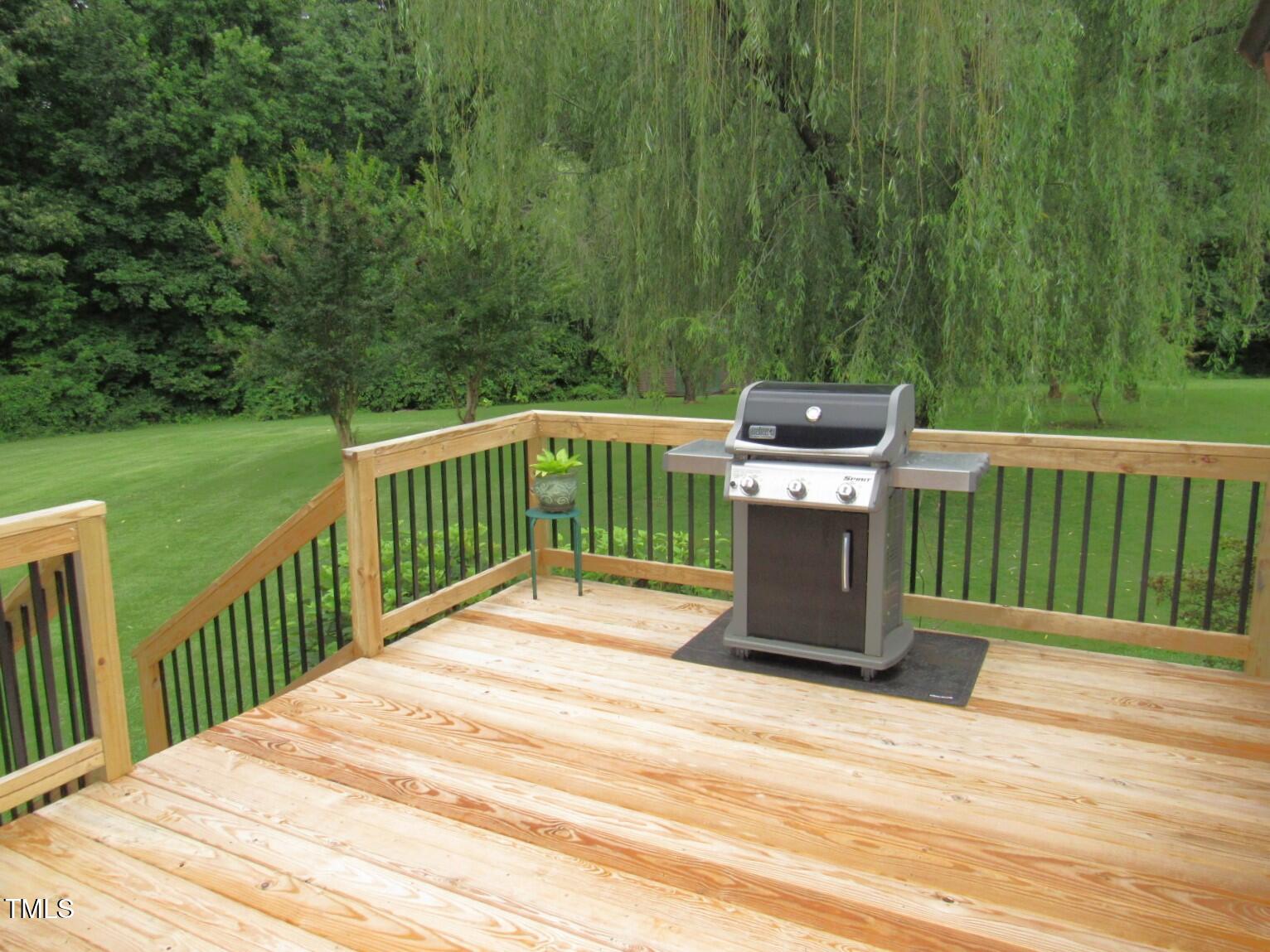 1159 Flemingtown Road Henderson, NC 27537 - Photo 39 of 51 a view of a balcony with wooden floor