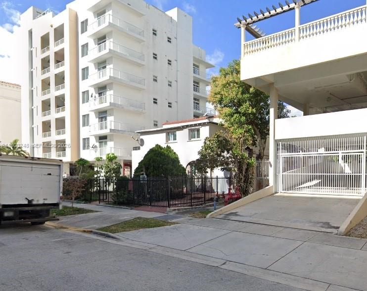 437 Northeast 30th Street Miami, FL 33137 - Photo 4 of 6 a view of a building with a street