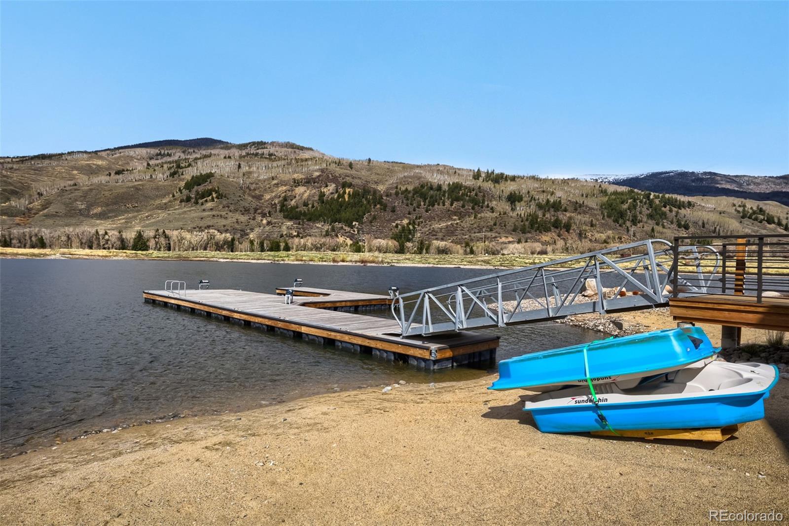 836 Maryland Creek Road Silverthorne, CO 80498 - Photo 41 of 49 a view of a swimming pool with lake view