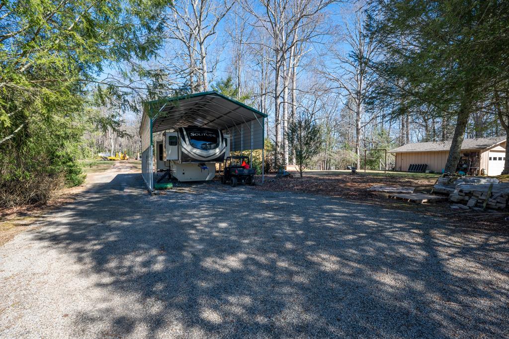 1550 Highway 2 Blue Ridge, GA 30513 - Photo 29 of 46 a view of a house with truck parked on the road