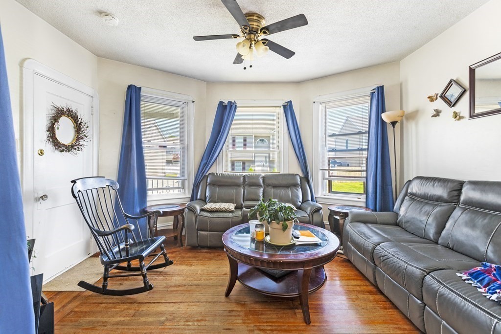 185 Stevens Street Fall River, MA 02721 - Photo 17 of 28 a living room with furniture and a window